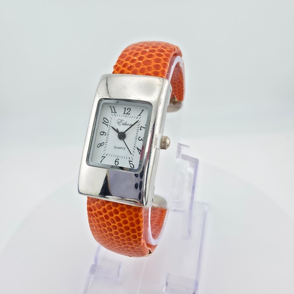 EIKON Ladies Cuff Watch Orange Faux Snakeskin Hinged Stainless Steel 5.75"